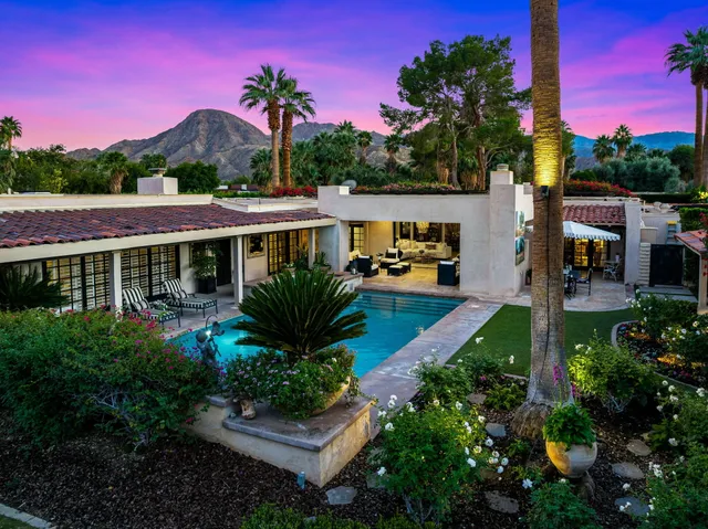 a view of a house with a garden