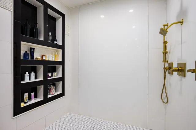 a room with furniture and a book shelf