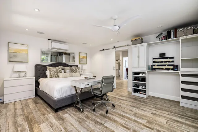 a living room with fireplace furniture and a flat screen tv