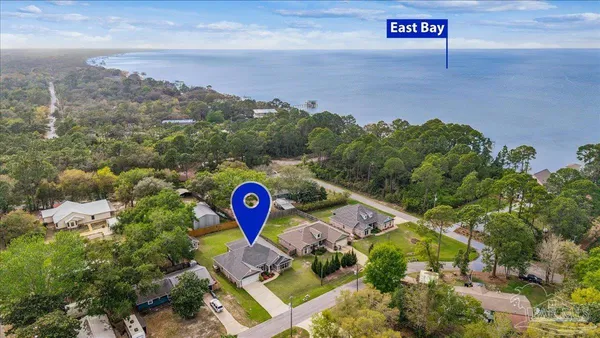 a view of a street with a sign board