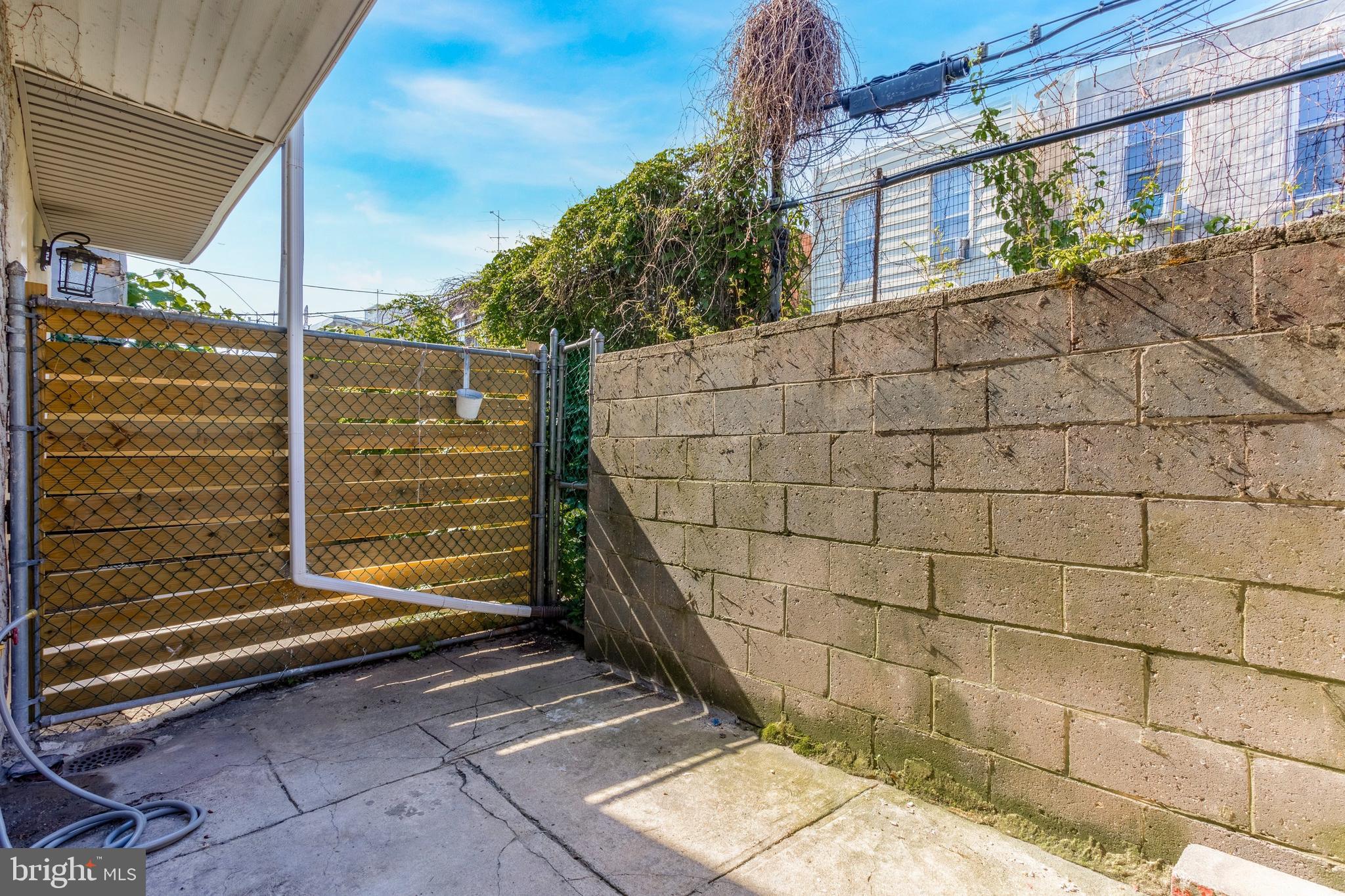 1930 Pierce Street Philadelphia, PA 19145 - Photo 13 of 16 a backyard of a house
