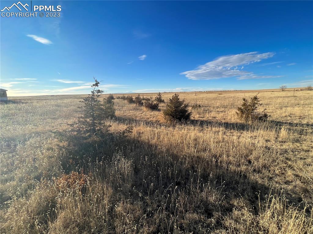 9350 Bowen Lane Yoder, CO 80864 - Photo 6 of 8 a view of ocean with sunset