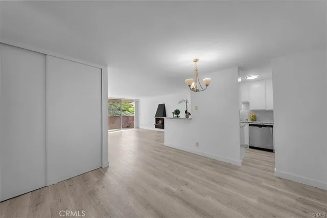 a view of a kitchen and a window