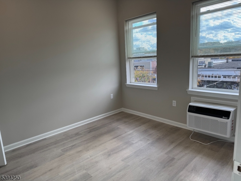 10 East Washington Avenue, Unit 201 Washington, NJ 07882 - Photo 5 of 5 an empty room with windows