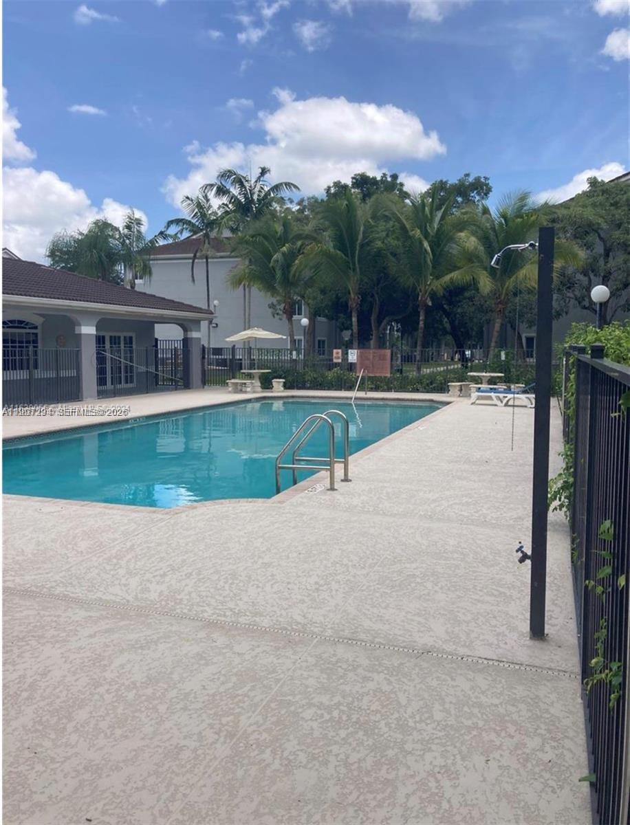 15470 Southwest 284th Street, Unit 3201 Homestead, FL 33033 - Photo 16 of 16 a view of a house with pool garden and patio