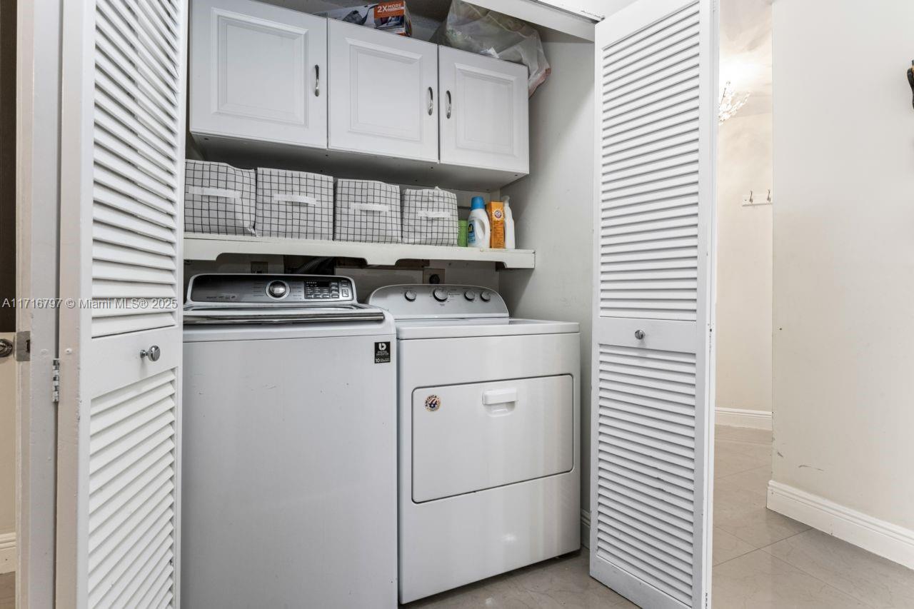 20929 Boca Ridge Drive West Boca Raton, FL 33428 - Photo 20 of 47 a utility room with dryer and washer