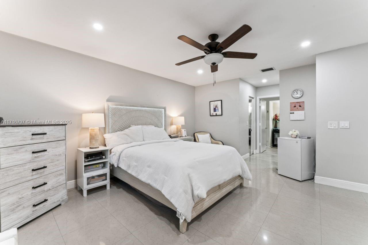 20929 Boca Ridge Drive West Boca Raton, FL 33428 - Photo 21 of 47 a bedroom with a bed and closet