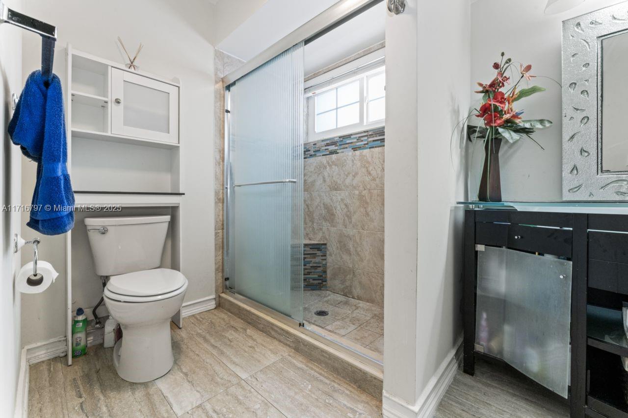 20929 Boca Ridge Drive West Boca Raton, FL 33428 - Photo 25 of 47 a bathroom with a toilet and a shower