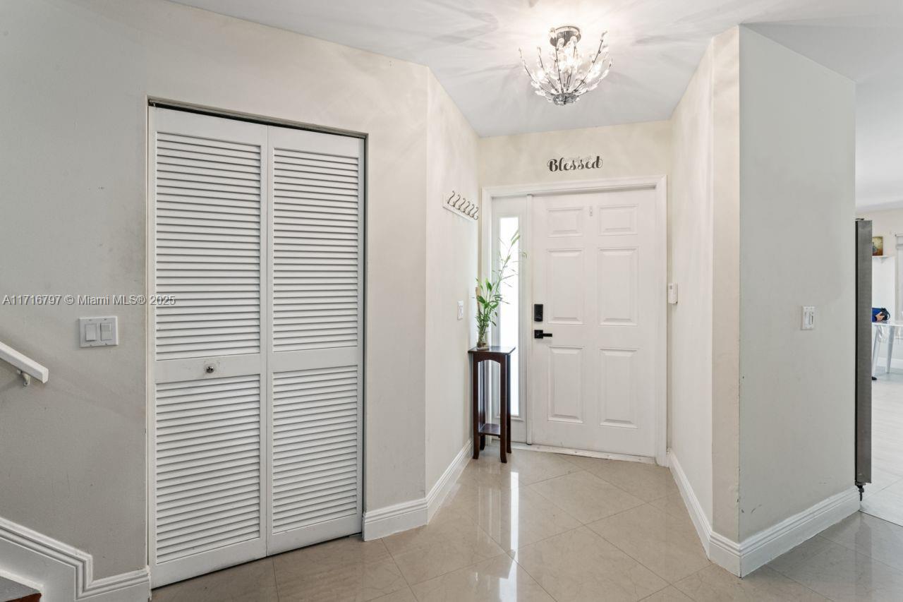 20929 Boca Ridge Drive West Boca Raton, FL 33428 - Photo 32 of 47 a view of a hallway with closet