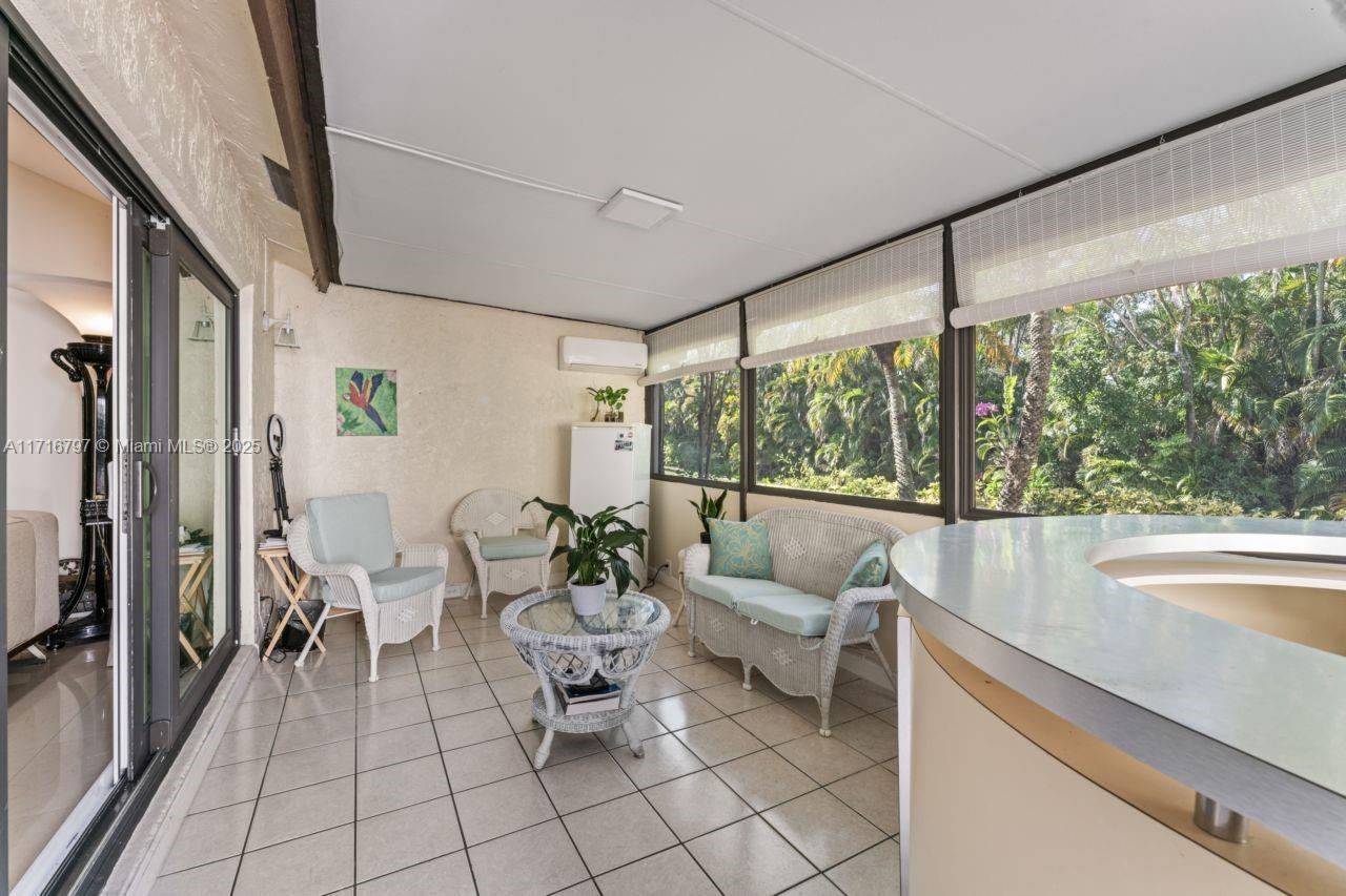 20929 Boca Ridge Drive West Boca Raton, FL 33428 - Photo 33 of 47 a living room with furniture and a large window