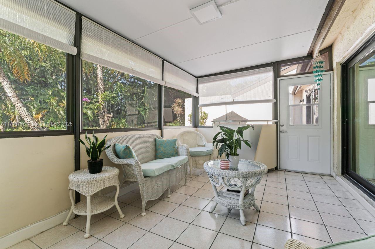20929 Boca Ridge Drive West Boca Raton, FL 33428 - Photo 34 of 47 a view of a dining room with furniture window and outside view