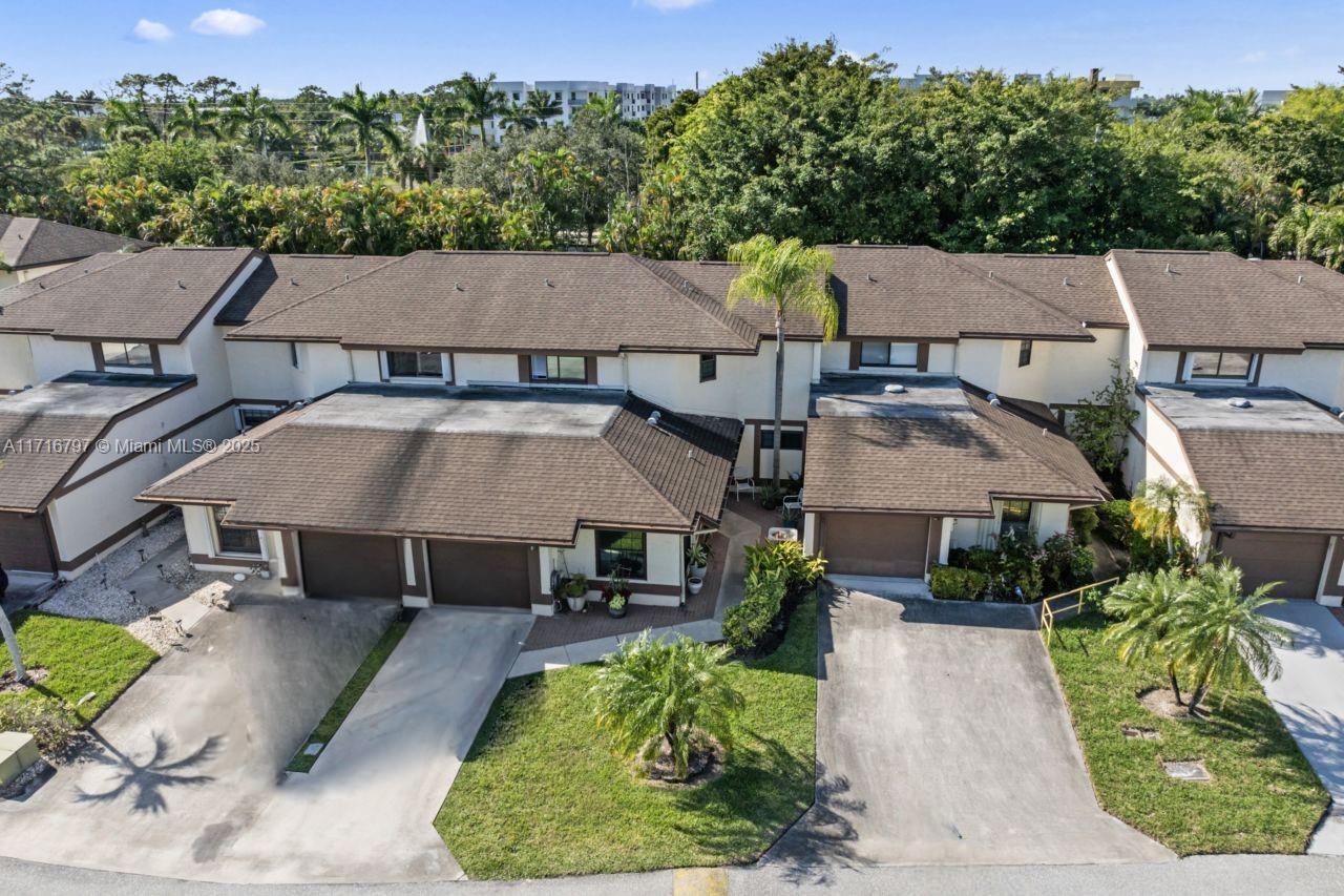 20929 Boca Ridge Drive West Boca Raton, FL 33428 - Photo 4 of 47 an aerial view of a house with a yard table and chairs