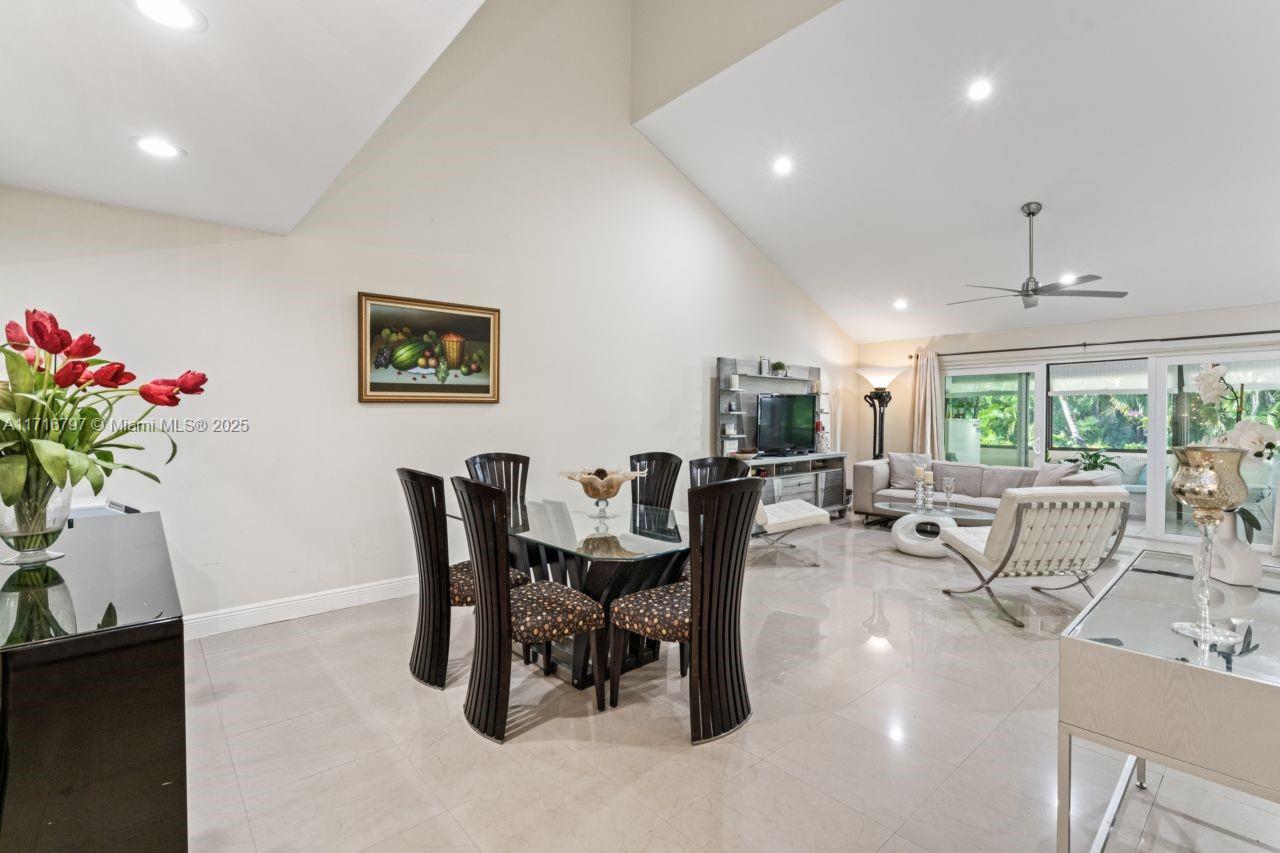 20929 Boca Ridge Drive West Boca Raton, FL 33428 - Photo 9 of 47 a view of a dining room with furniture window and outside view