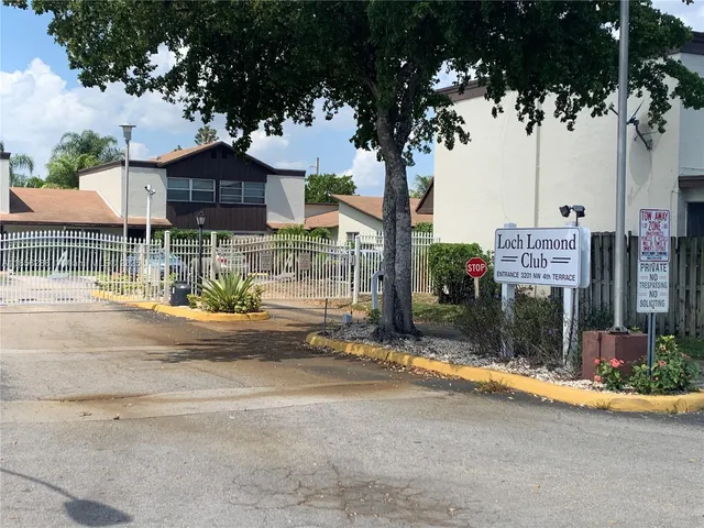 a front view of a house with street