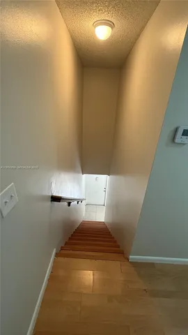 a view of storage and utility room with empty racks