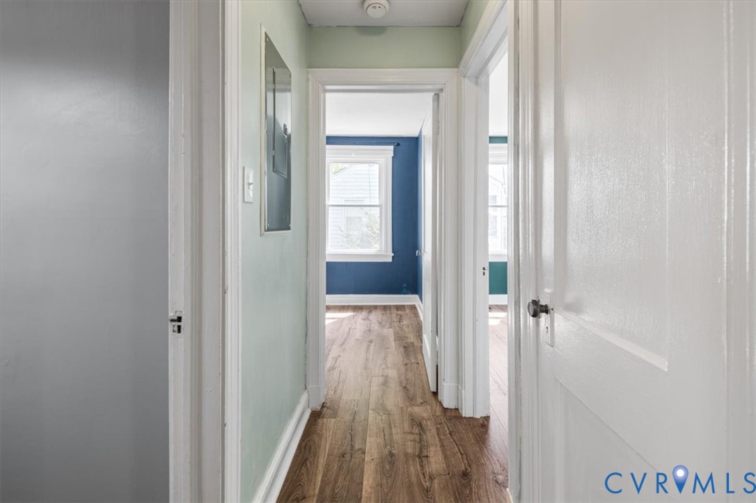 6805 Hermitage Road Henrico, VA 23228 - Photo 20 of 46 a view of a hallway with wooden floor and closet area