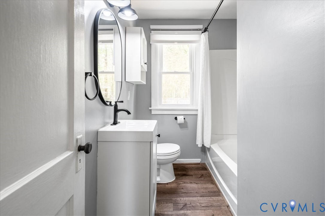 6805 Hermitage Road Henrico, VA 23228 - Photo 21 of 46 a bathroom with a sink a toilet and shower
