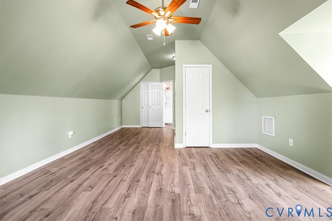 6805 Hermitage Road Henrico, VA 23228 - Photo 33 of 46 a view of empty room with wooden floor