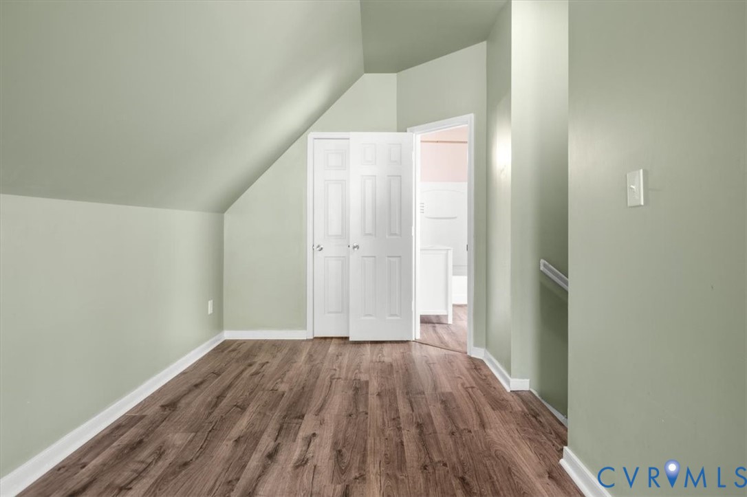 6805 Hermitage Road Henrico, VA 23228 - Photo 35 of 46 a view of a hallway with wooden floor
