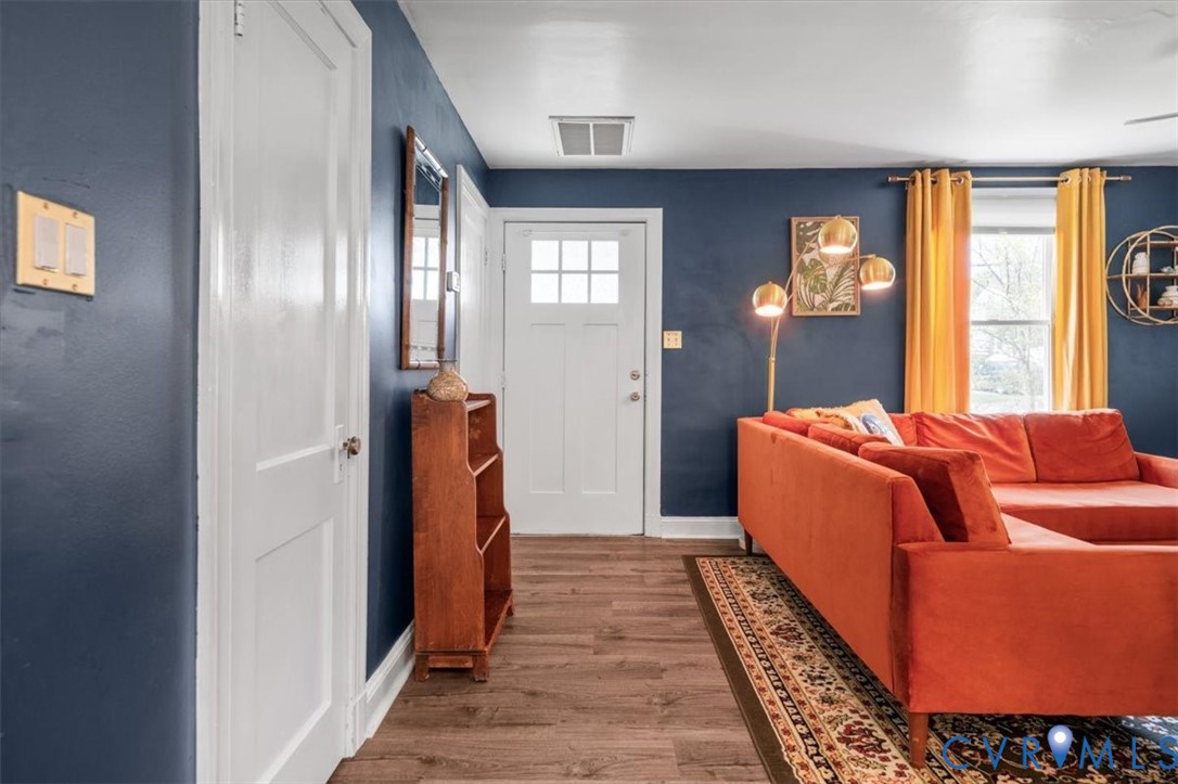 6805 Hermitage Road Henrico, VA 23228 - Photo 5 of 46 a bed room with a bed and a mirror