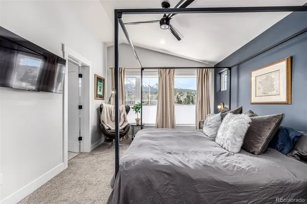 a bathroom with double vanity sinks a vanity and a mirror