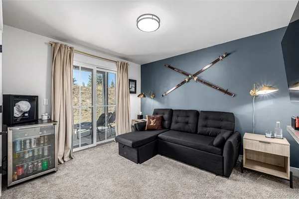 a bathroom with a shower toilet and sink