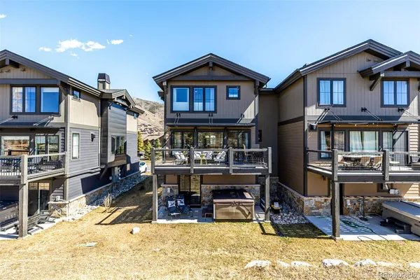 a front view of a house with a garage