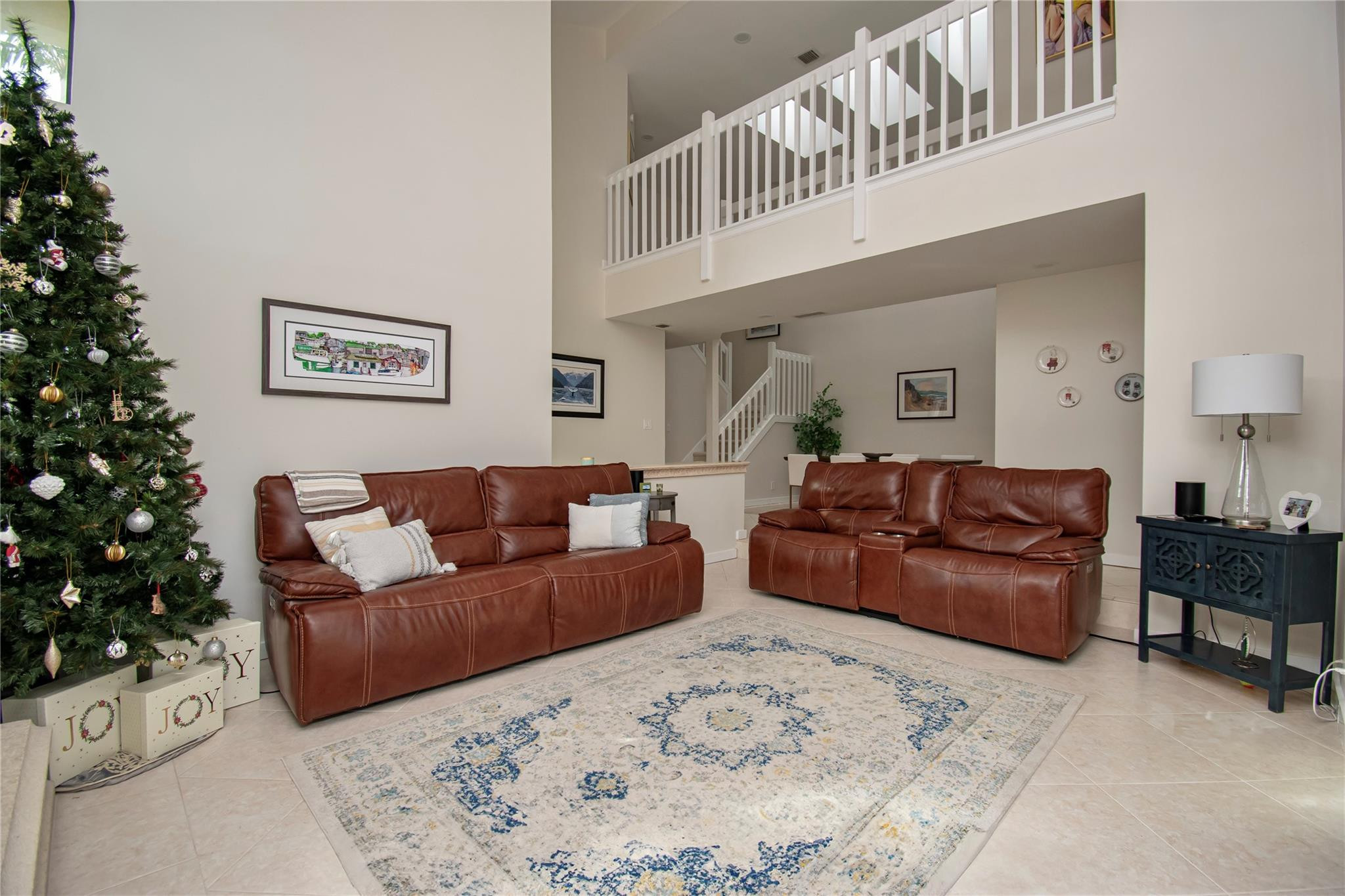 21694 Town Pl Drive Boca Raton, FL 33433 - Photo 14 of 55 a living room with a couch and a potted plant