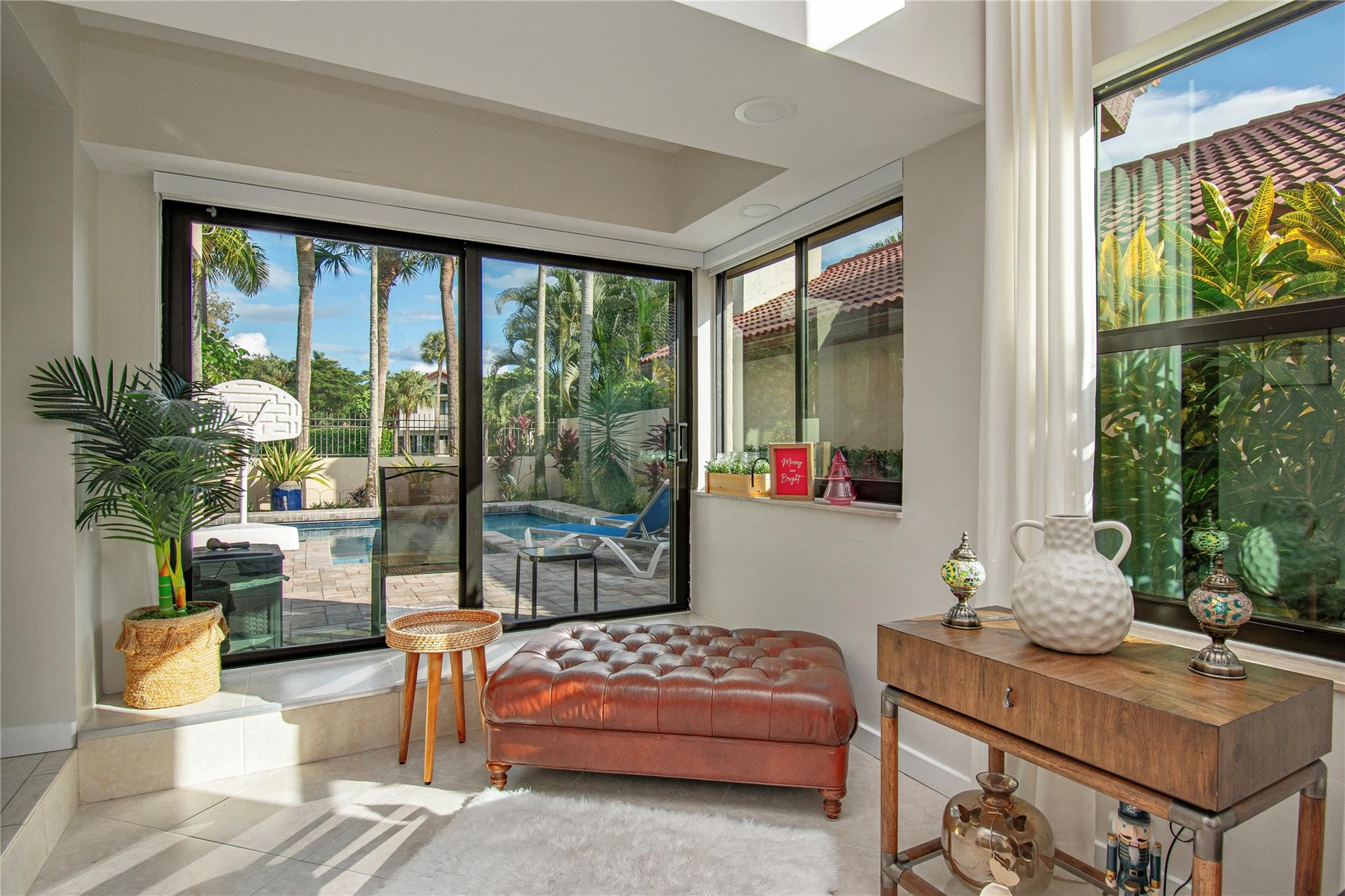 21694 Town Pl Drive Boca Raton, FL 33433 - Photo 15 of 55 a living room with patio furniture and a potted plant