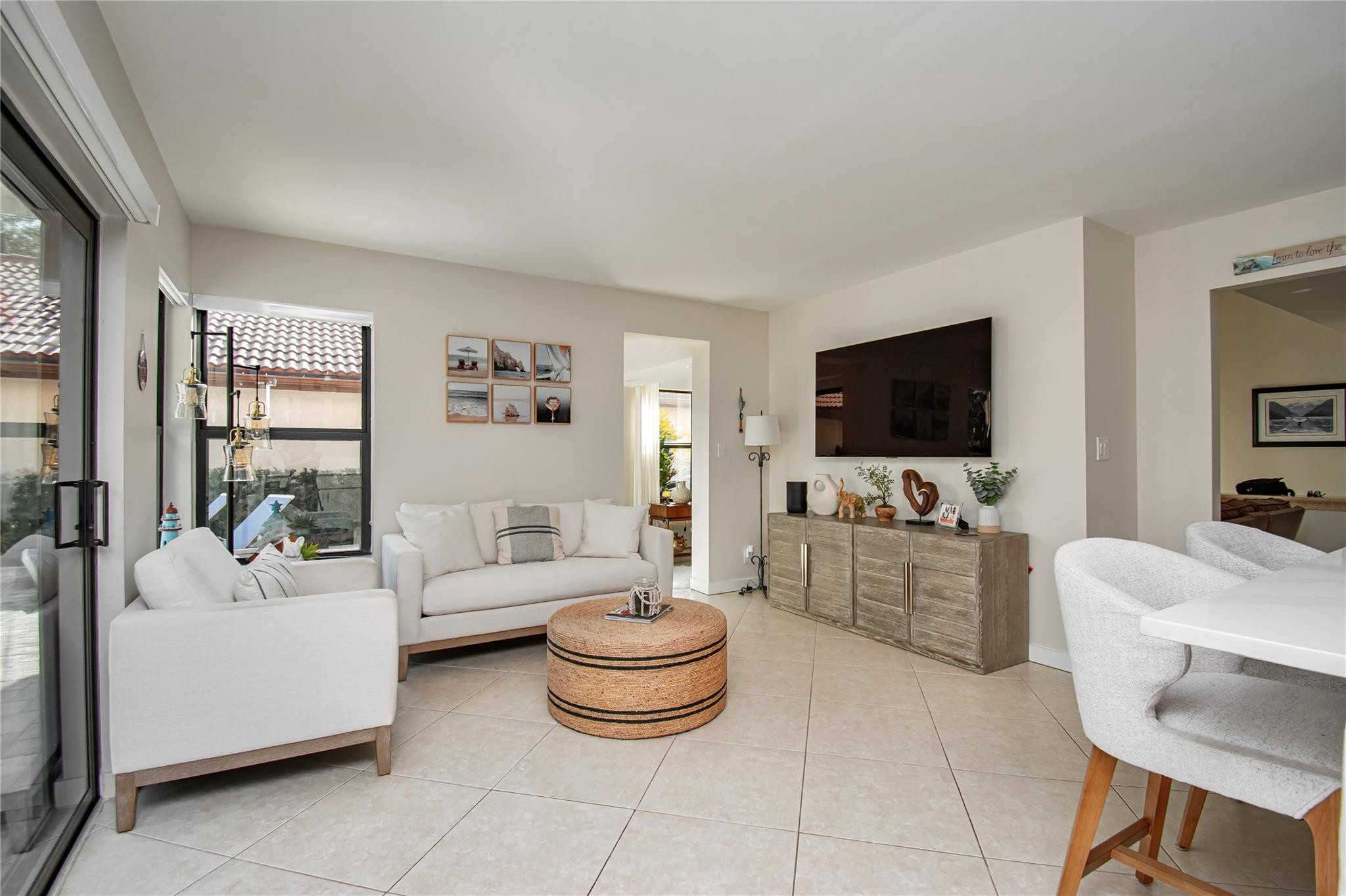 21694 Town Pl Drive Boca Raton, FL 33433 - Photo 19 of 55 a living room with furniture and a flat screen tv