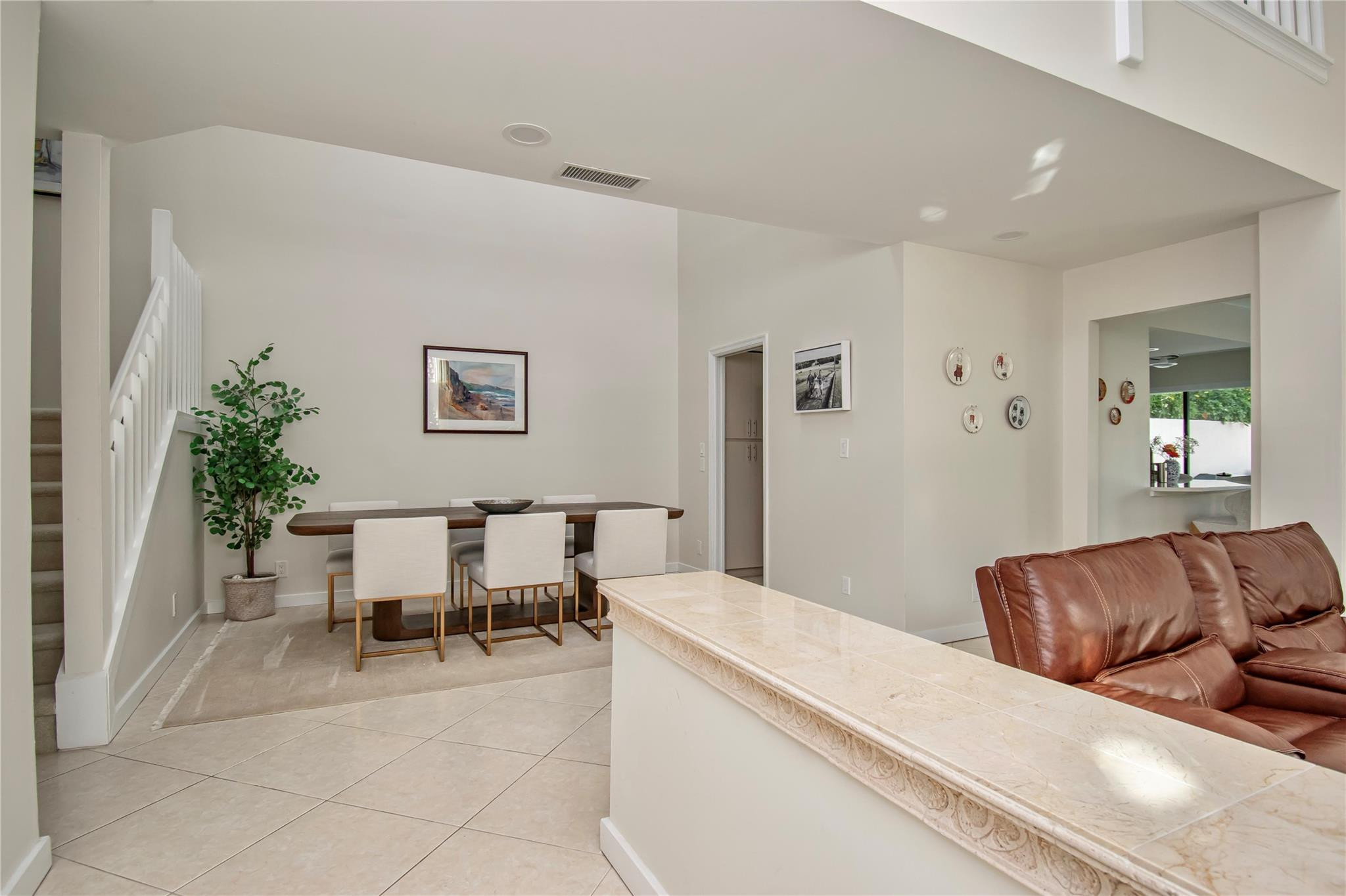 21694 Town Pl Drive Boca Raton, FL 33433 - Photo 20 of 55 a living room with furniture and flowers