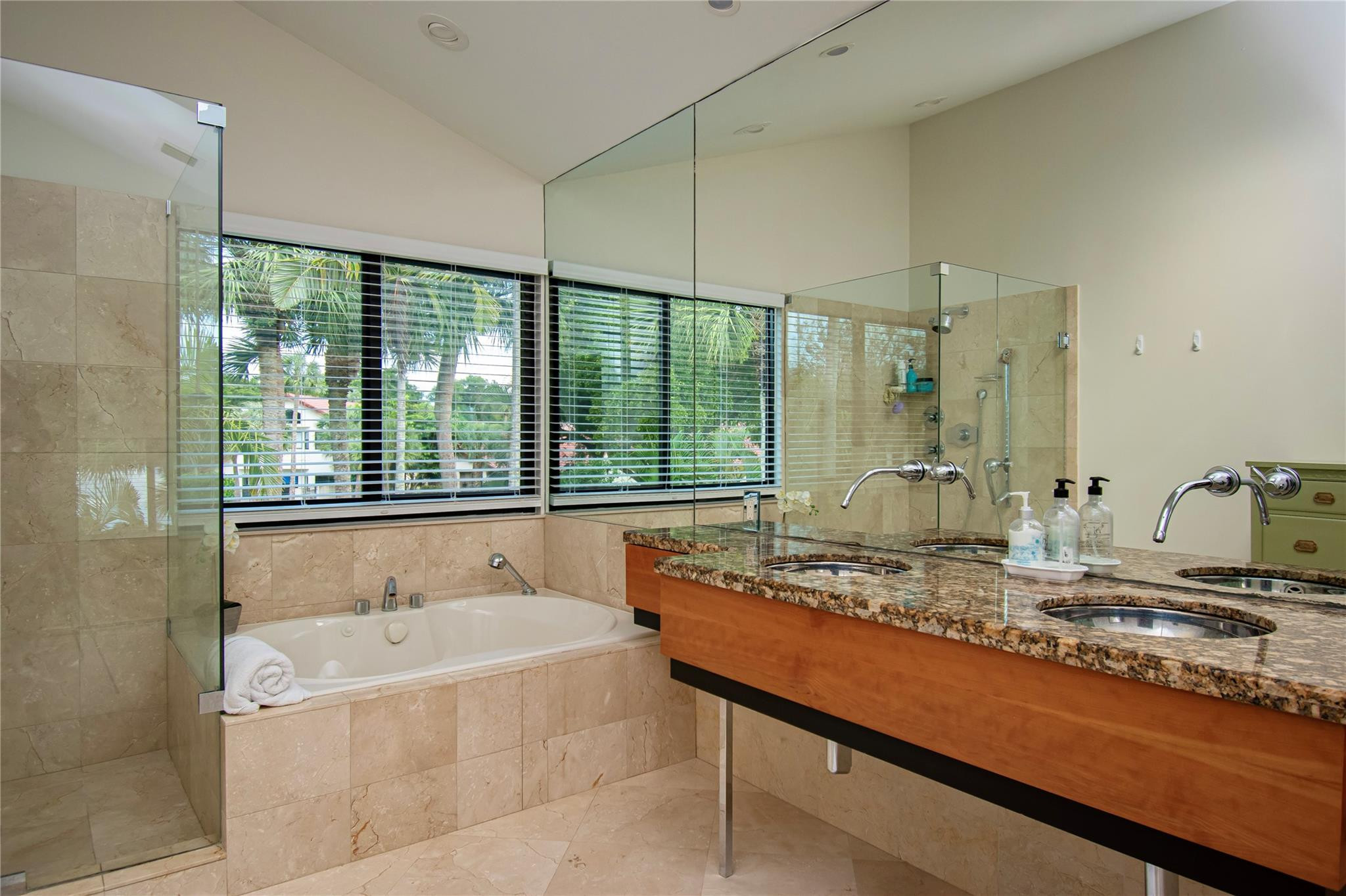 21694 Town Pl Drive Boca Raton, FL 33433 - Photo 35 of 55 a bathroom with a granite countertop bathtub sink and mirror