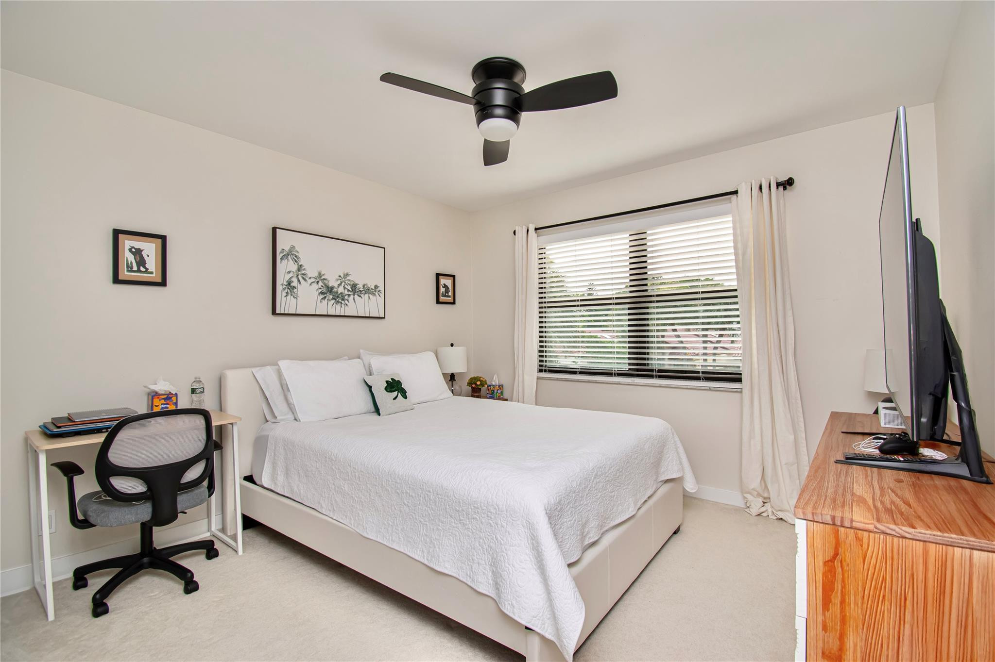 21694 Town Pl Drive Boca Raton, FL 33433 - Photo 42 of 55 a bedroom with a bed and a flat screen tv