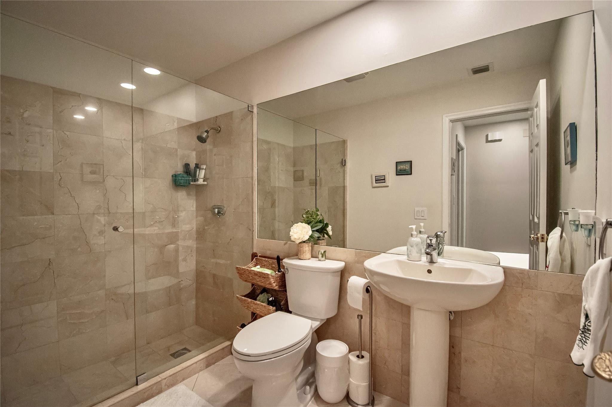 21694 Town Pl Drive Boca Raton, FL 33433 - Photo 46 of 55 a bathroom with a sink toilet and shower