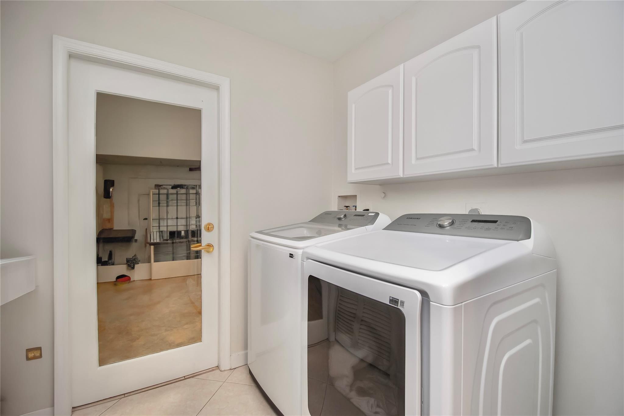 21694 Town Pl Drive Boca Raton, FL 33433 - Photo 47 of 55 a utility room with washer and dryer