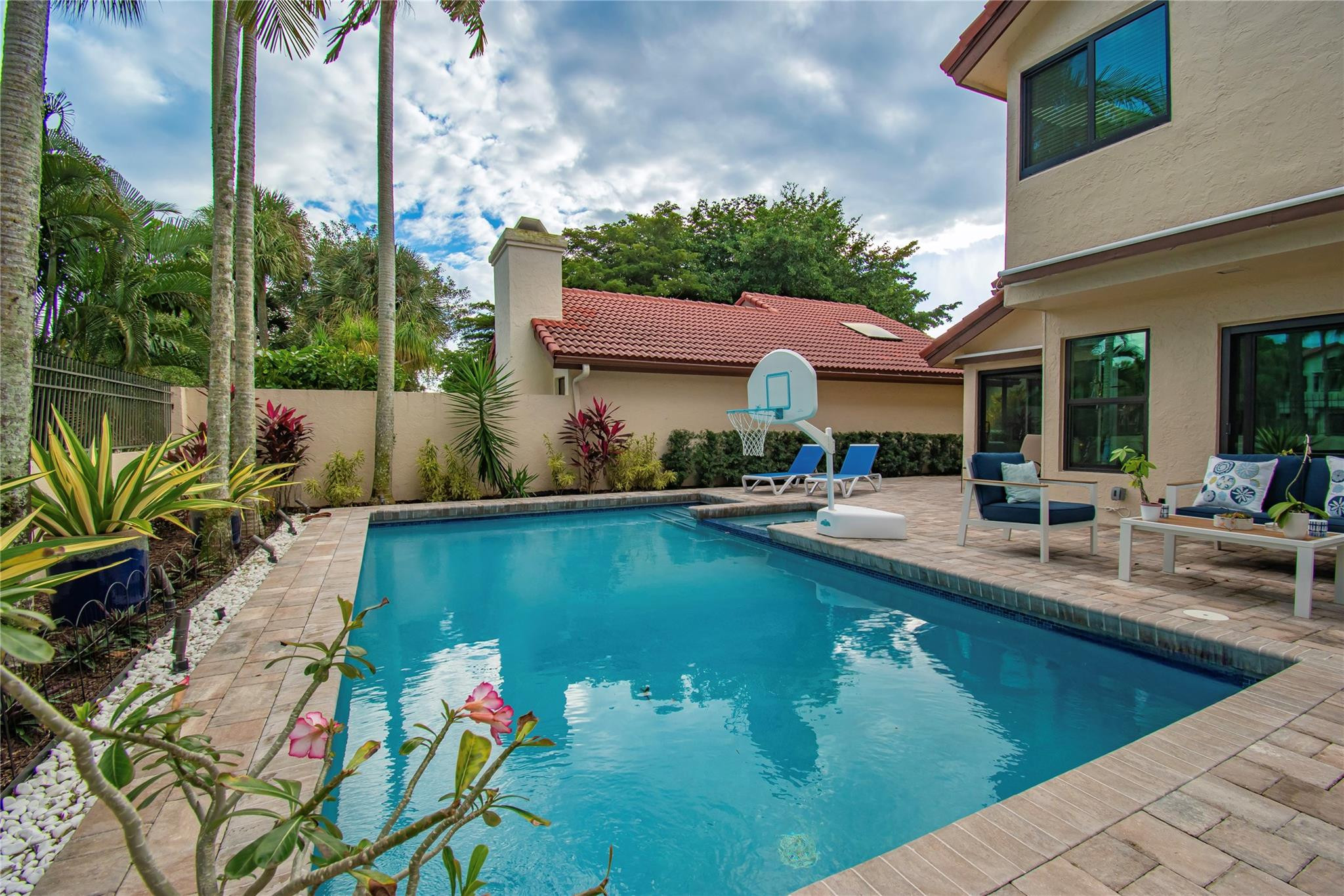 21694 Town Pl Drive Boca Raton, FL 33433 - Photo 50 of 55 a view of a swimming pool with outdoor seating