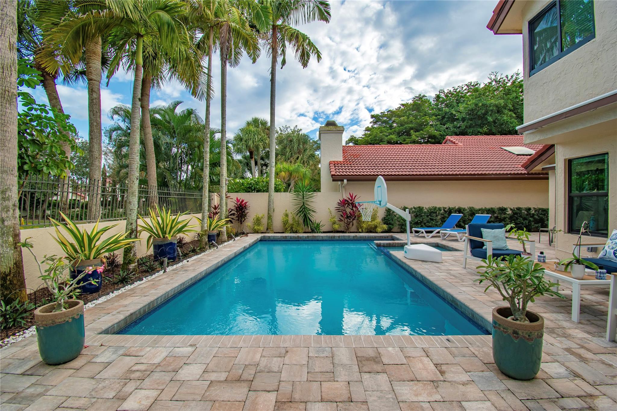 21694 Town Pl Drive Boca Raton, FL 33433 - Photo 52 of 55 a view of swimming pool with outdoor seating and plants