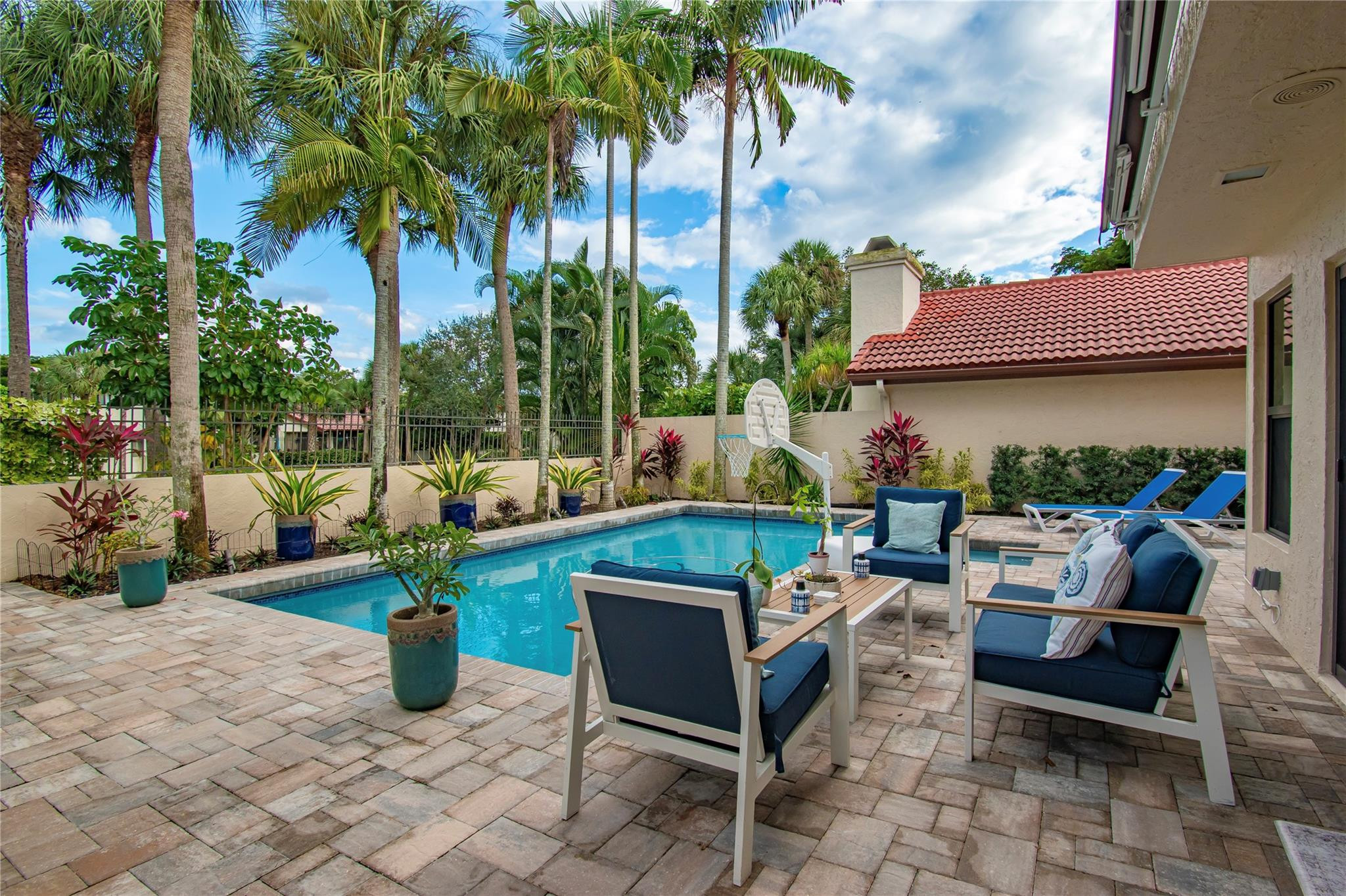 21694 Town Pl Drive Boca Raton, FL 33433 - Photo 53 of 55 a view of a patio with couches and potted plants