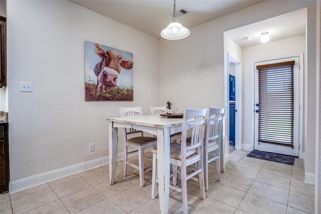 512 Barnstorm Drive Prosper, TX 75078 - Photo 11 of 25 a dining room with furniture and window