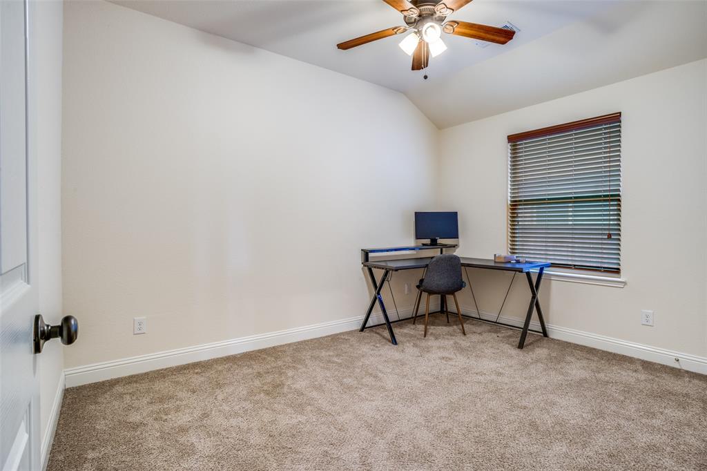 512 Barnstorm Drive Prosper, TX 75078 - Photo 17 of 25 a living room with furniture and a window