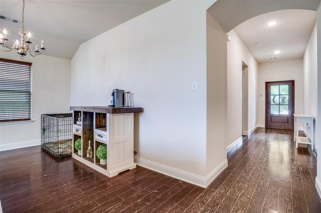 512 Barnstorm Drive Prosper, TX 75078 - Photo 4 of 25 a view of livingroom with furniture and wooden floor