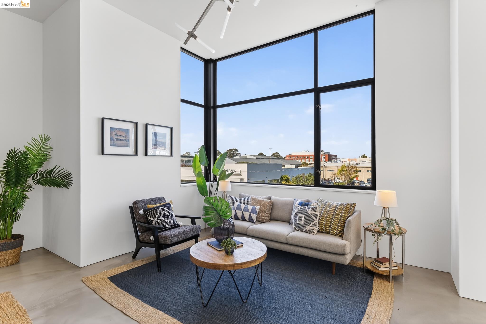 811 Folger Avenue Berkeley, CA 94710 - Photo 5 of 41 a living room with furniture and a window