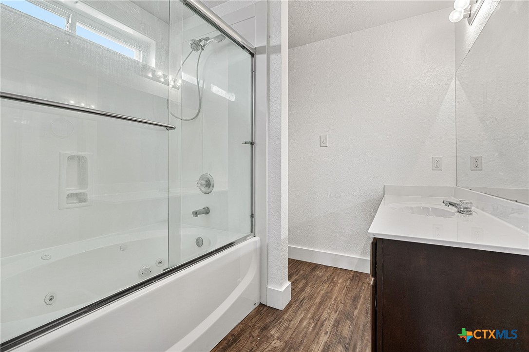 3208 Viewcrest Drive Killeen, TX 76549 - Photo 8 of 15 a bathroom with a sink and a mirror