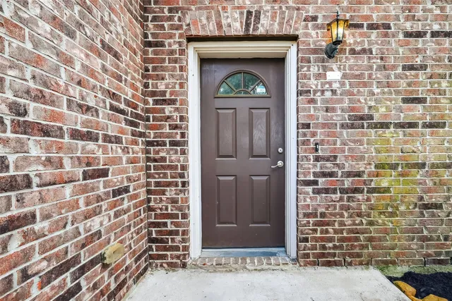 a front view of a house with a door