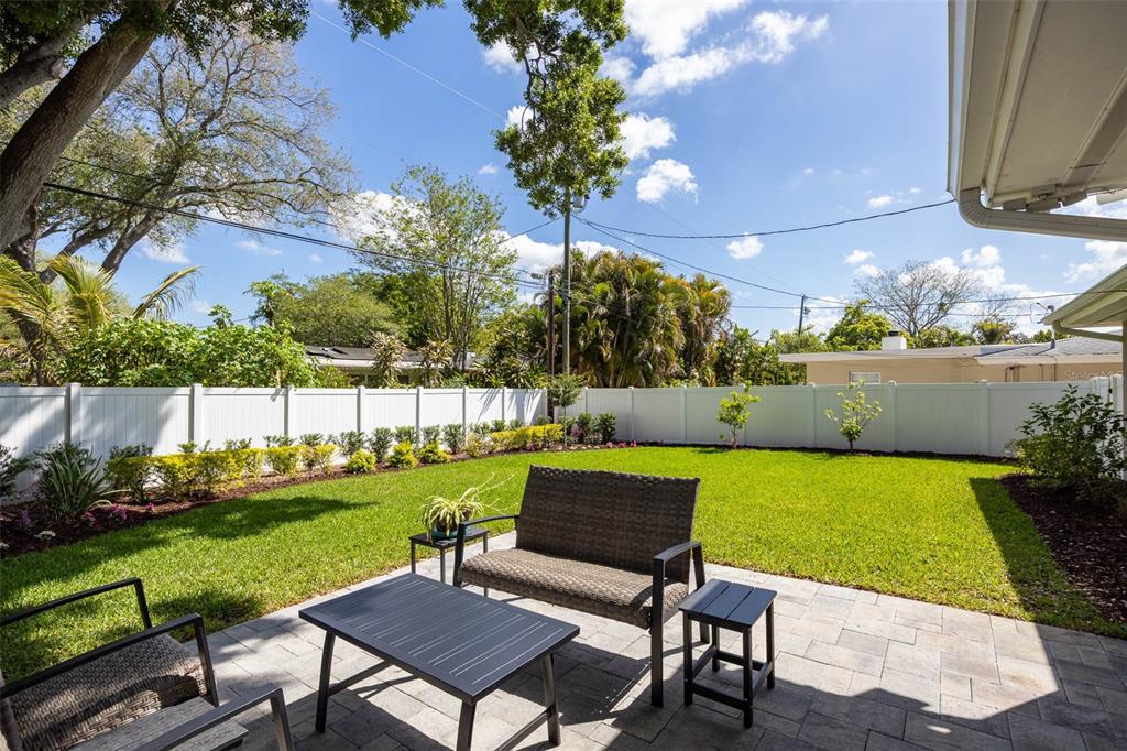 1218 Taylor Avenue Dunedin, FL 34698 - Photo 19 of 53 a view of a garden with patio