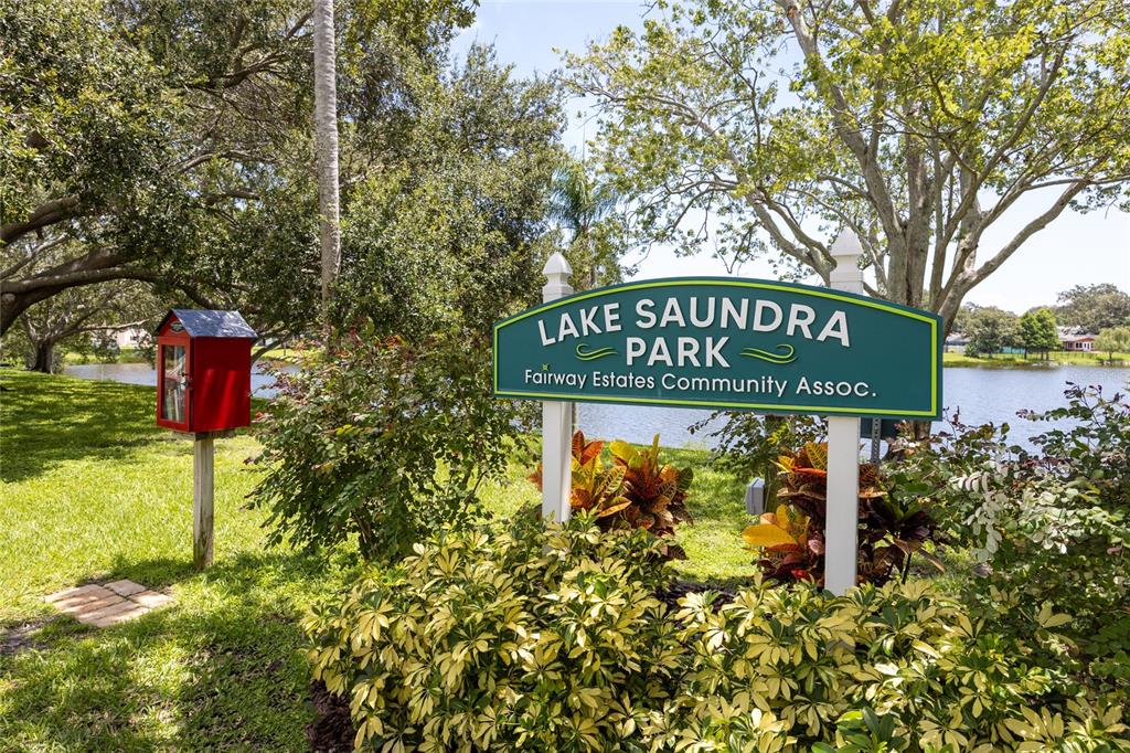 1218 Taylor Avenue Dunedin, FL 34698 - Photo 27 of 53 a sign broad on the side of the road