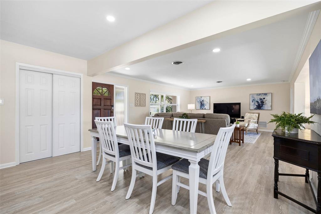 1218 Taylor Avenue Dunedin, FL 34698 - Photo 38 of 53 a view of a dining room with furniture and a livingroom