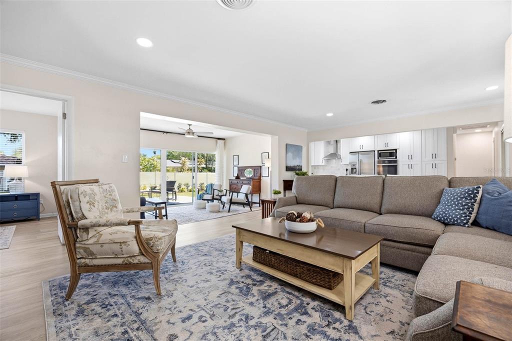 1218 Taylor Avenue Dunedin, FL 34698 - Photo 42 of 53 a living room with furniture and a large window