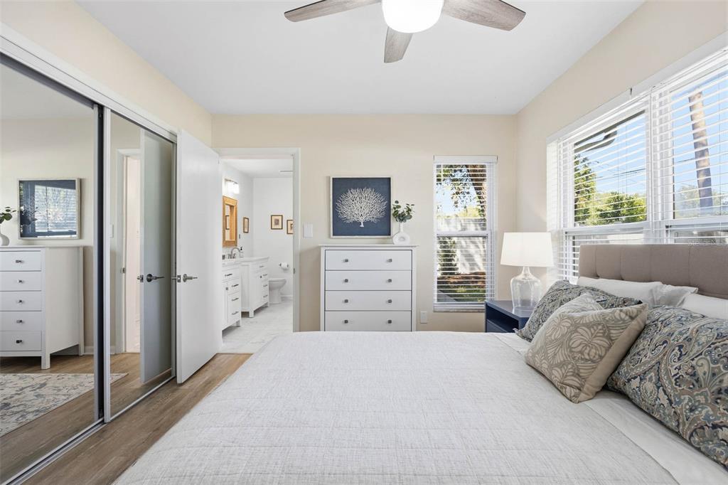 1218 Taylor Avenue Dunedin, FL 34698 - Photo 45 of 53 a bedroom with furniture and a flat screen tv