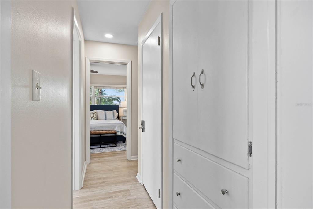 1218 Taylor Avenue Dunedin, FL 34698 - Photo 49 of 53 a bathroom with a glass door shower